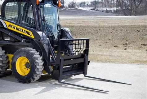 skid steer t|lifting a skid steer.